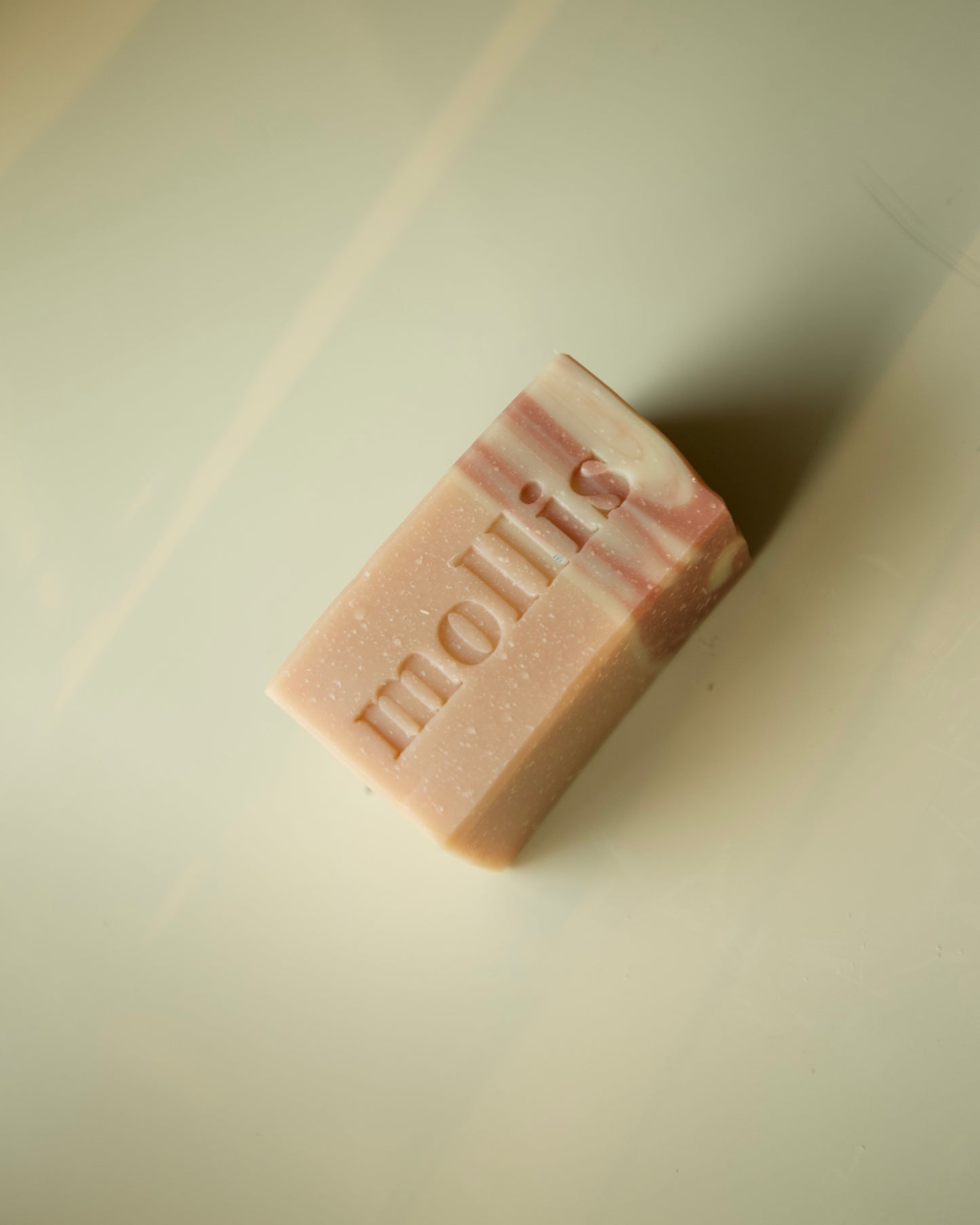 rose geranium, honeysuckle, Moroccan red clay, coconut milk)