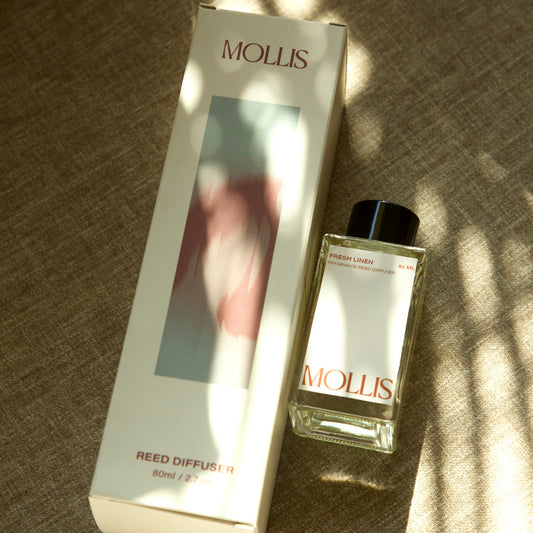 Mollis Amber Ash reed diffuser India — warm woody natural home fragrance handmade