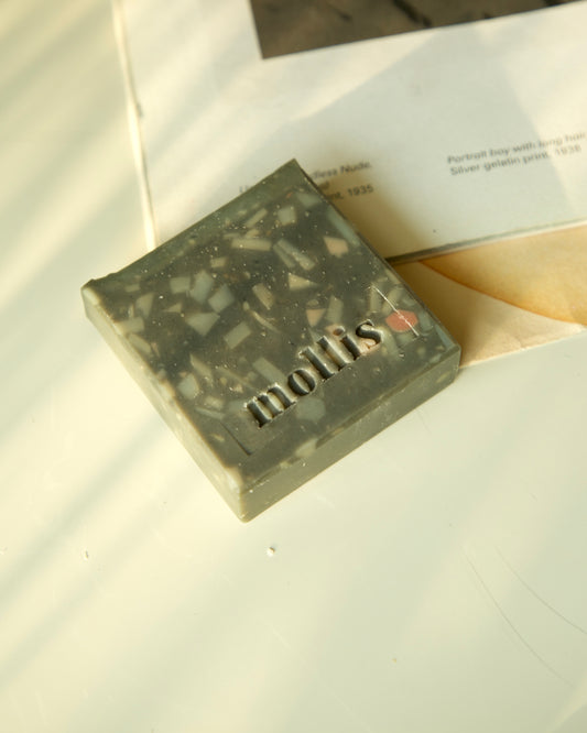 Smooth-textured handmade soap with charcoal and kaolin clay for purifying cleanse