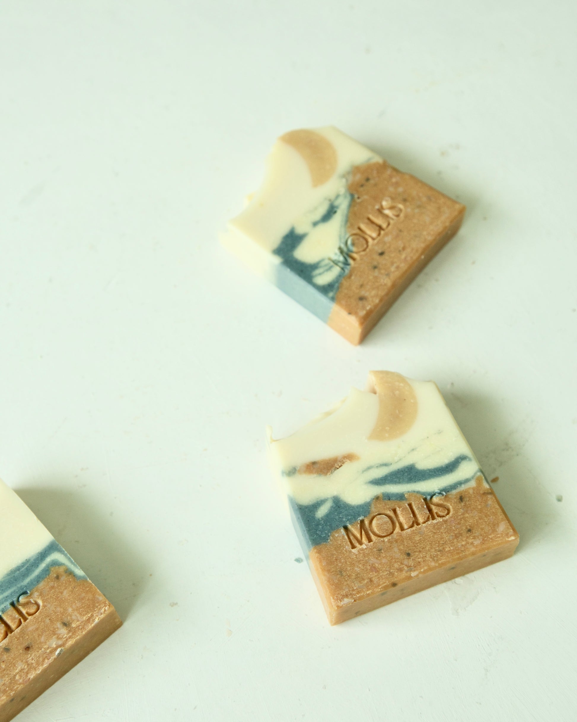 Three bars of MOLLiS soap on a white background Neroli Handmade soap bars